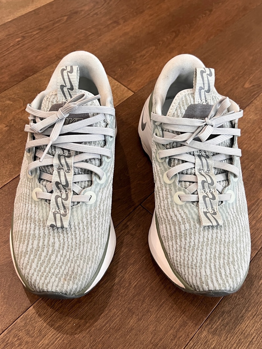 Like new Nike Light Green and Grey Knit Running Shoes